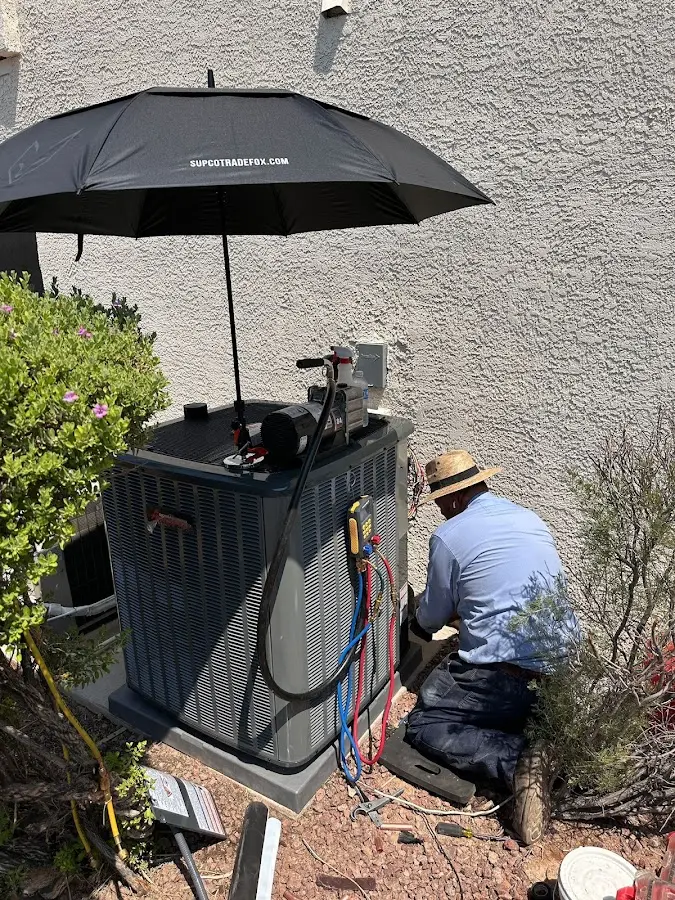HVAC technician performing outdoor AC maintenance in Secaucus